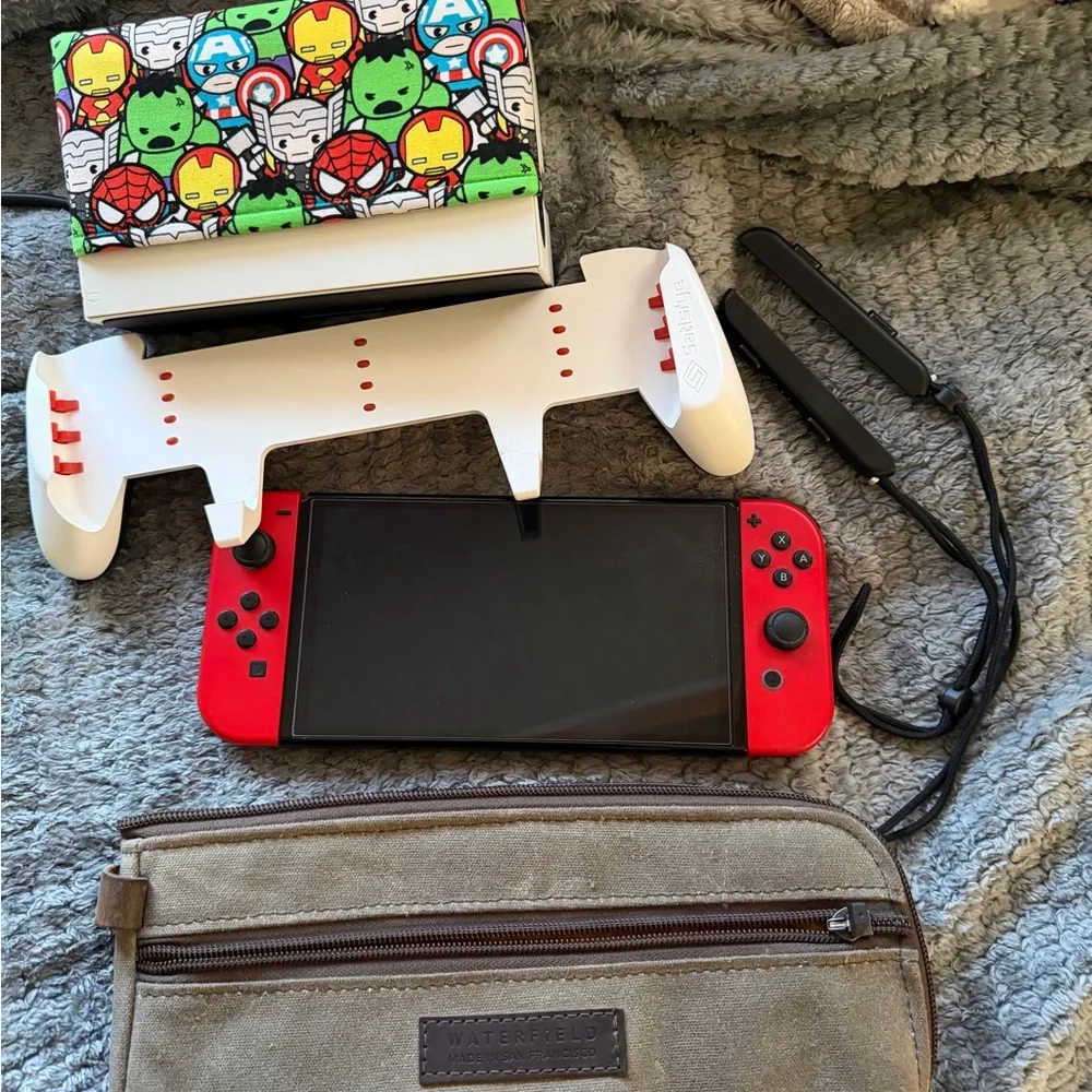 Nintendo Switch OLED Bundle 4 Joy-con sets + 5 Games and 13 xtra gamesDownloaded